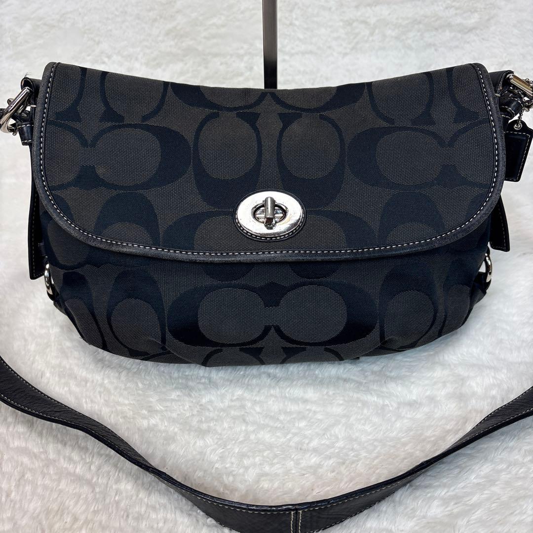 人気　コーチ シグネチャー ショルダーバッグ ブラック ターンロックCOACH;没有明显的损伤或污渍