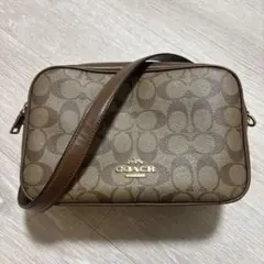 COACH（コーチ）シグネチャー ショルダーバッグ ブラウン カメラバッグ